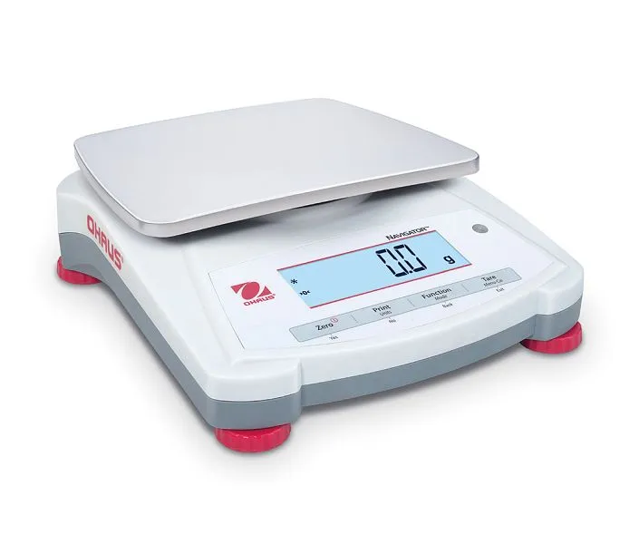 OHAUS Balance portable NV1201 EU capacité de pesée 1200 g lisibilité lors d'une pesée de 01 g 30456387 se procure...