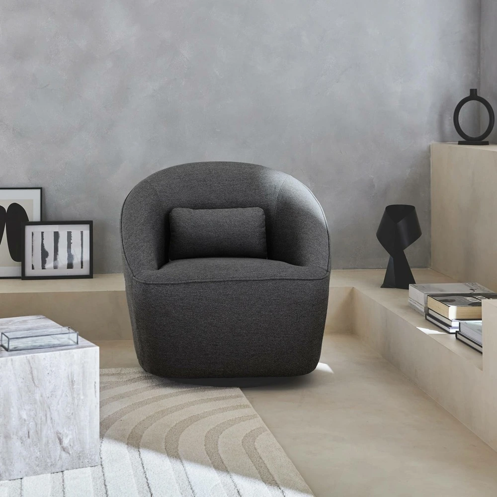 Fauteuil pivotant 360° en tissu gris profond avec coussin. Lana l 80 x p 73 x h77cm
