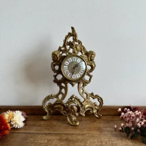 Horloge en bronze numérotée et signée