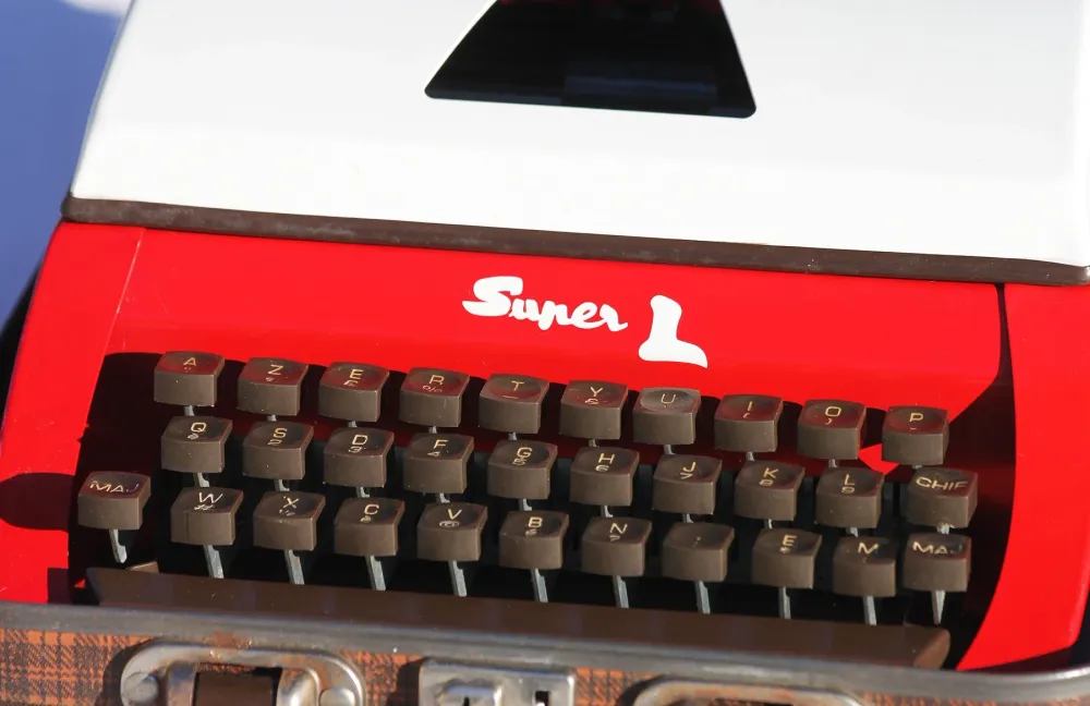 Machine à écrire Junior vintage rouge orangé modèle Super L Lilliput