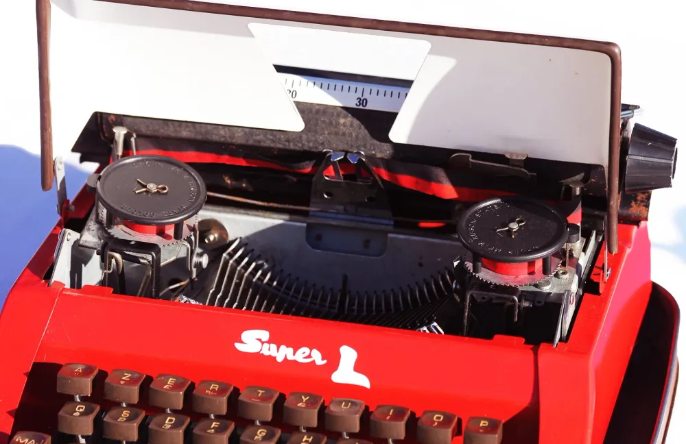 Machine à écrire Junior vintage rouge orangé modèle Super L Lilliput