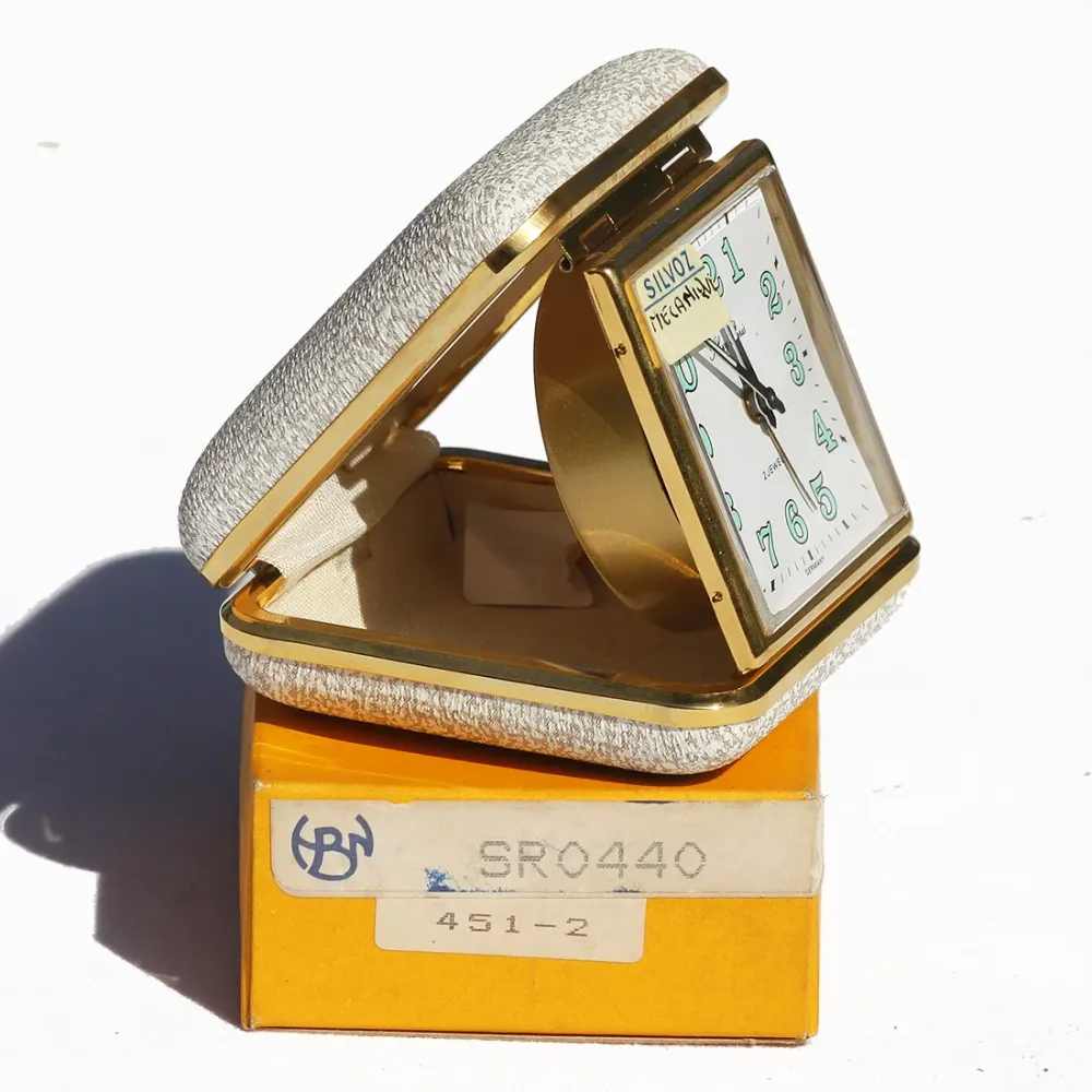 Réveil de voyage mécanique vintage Silvoz Paris en boîte ( comme neuf )